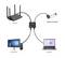 Diagram znázorňující síťové zapojení: router je připojen k rozbočovači, který je propojen s počítačem a laptopem. Napájecí adaptér není součástí balení.