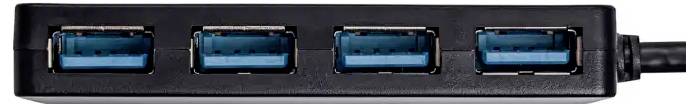 Černý USB hub se čtyřmi USB 3.0 porty vedle sebe; umožňuje připojení více zařízení k počítači.