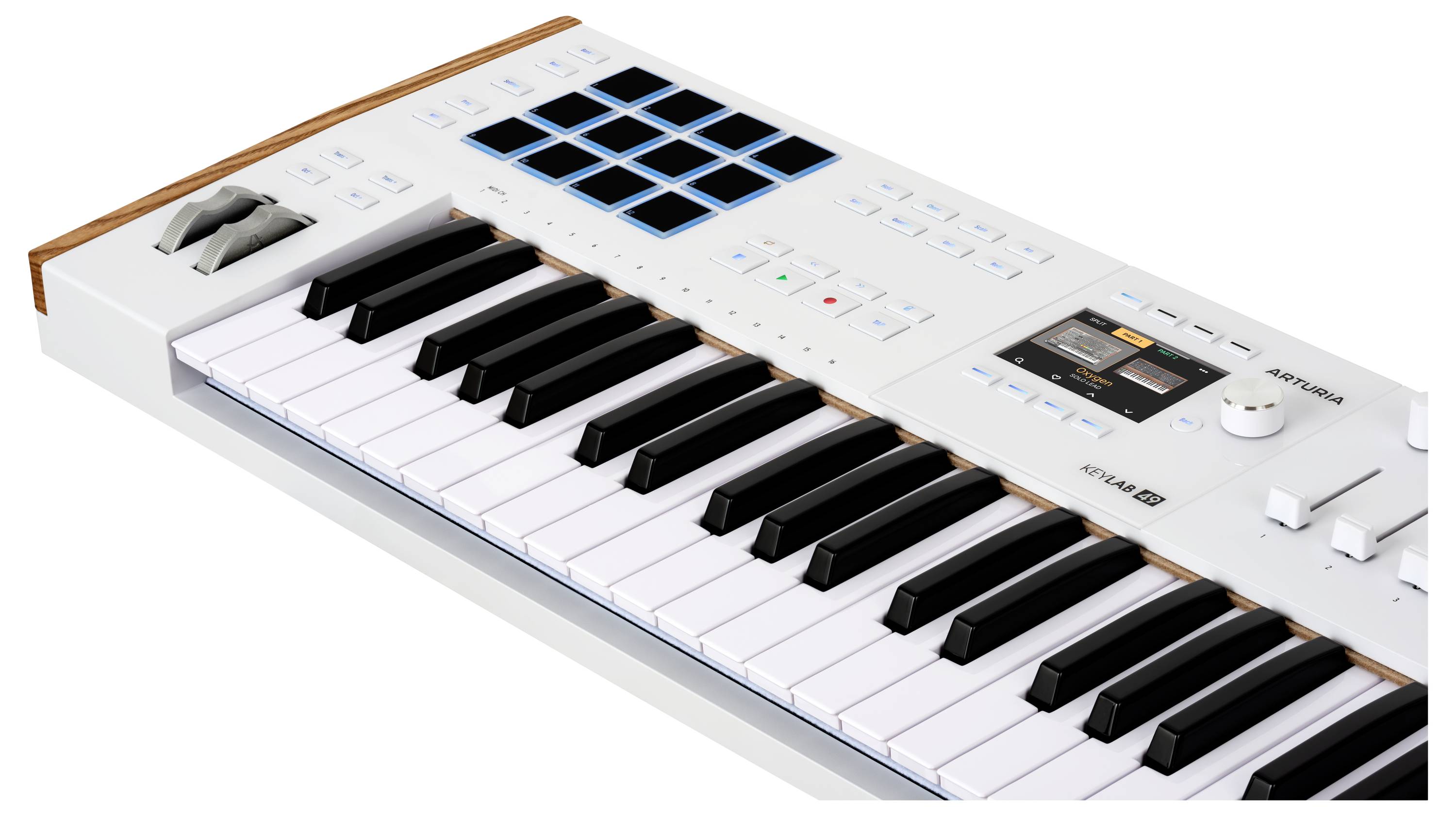 MIDI kontroler s klaviaturou a drum pady, vedle tlačítek a regulátorů. Vhodný pro hudební produkci a ovládání.
