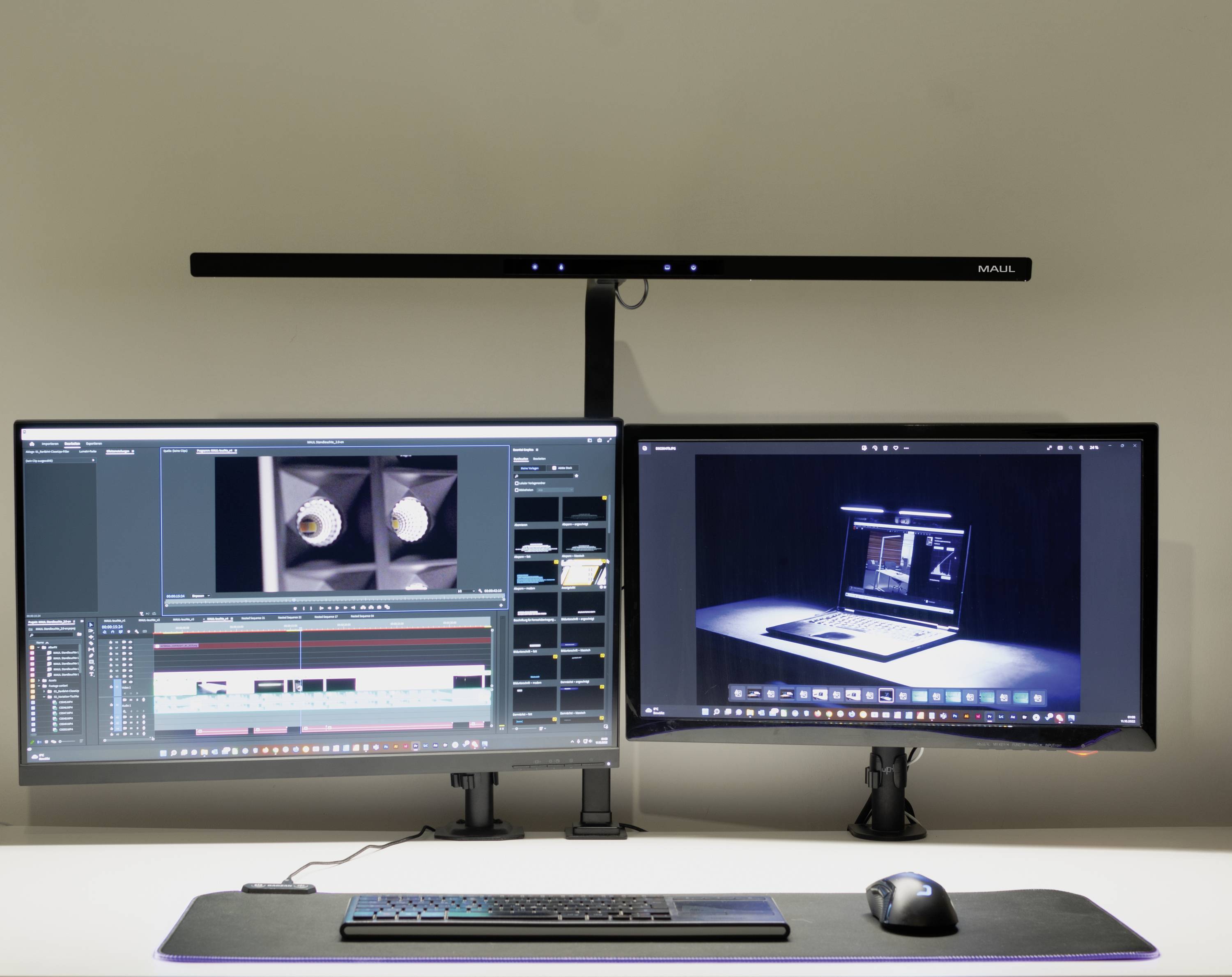 Duální nastavení monitorů na stole zobrazuje software pro úpravu videí na jedné obrazovce a aplikaci pro úpravu fotografií na druhé.