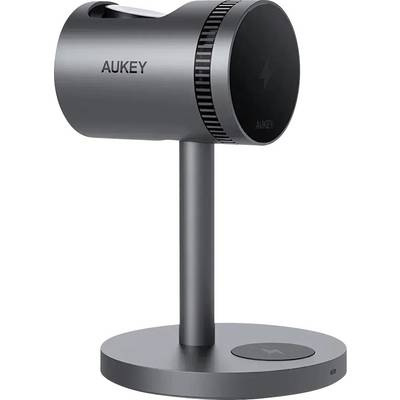 Elegantní, moderní černý bezdrátový nabíjecí stojan značky 'AUKEY' s bočním nápisem, s kulatou základnou a vertikálním designem.