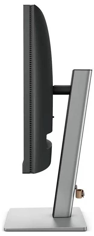 Boční pohled na moderní tenký počítačový monitor na kovovém stojanu, zobrazující štíhlý profil a minimalistický design.