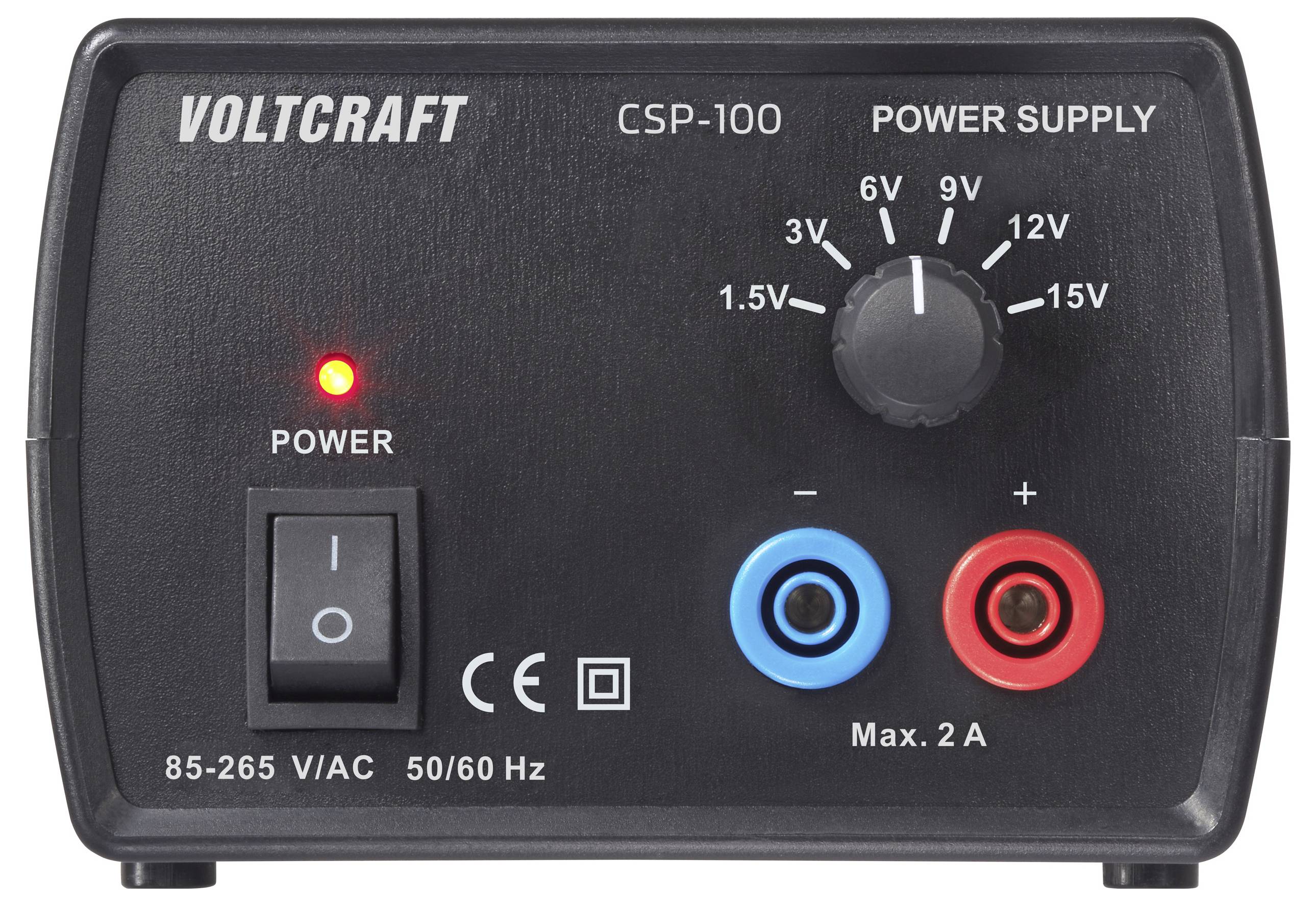 Jednotka napájecího zdroje napětí zobrazující "VOLTCRAFT CSP-100". Vybavena nastavovacím knoflíkem napětí s rozsahem 1,5V až 15V, vypínačem napájení a výstupy označené modrou a červenou barvou.