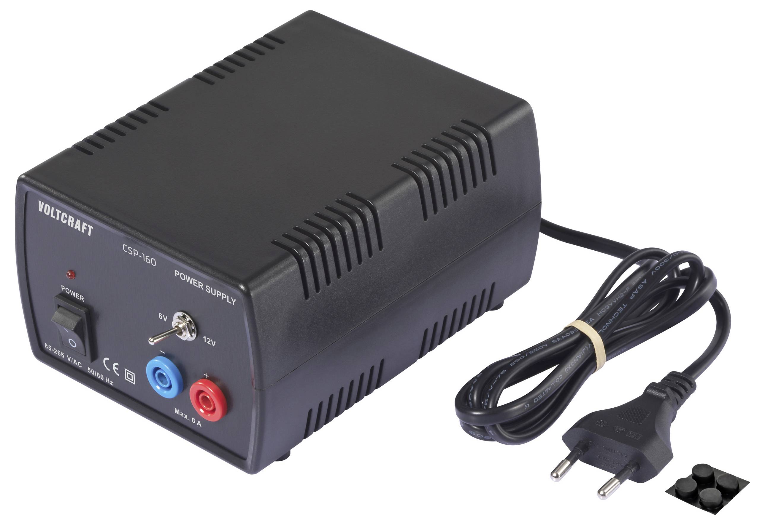 Černá napájecí jednotka značky 'Voltcraft' s výstupními napětími 3V, 5V, 6V, 9V a 12V, vybavená vypínačem a konektory.