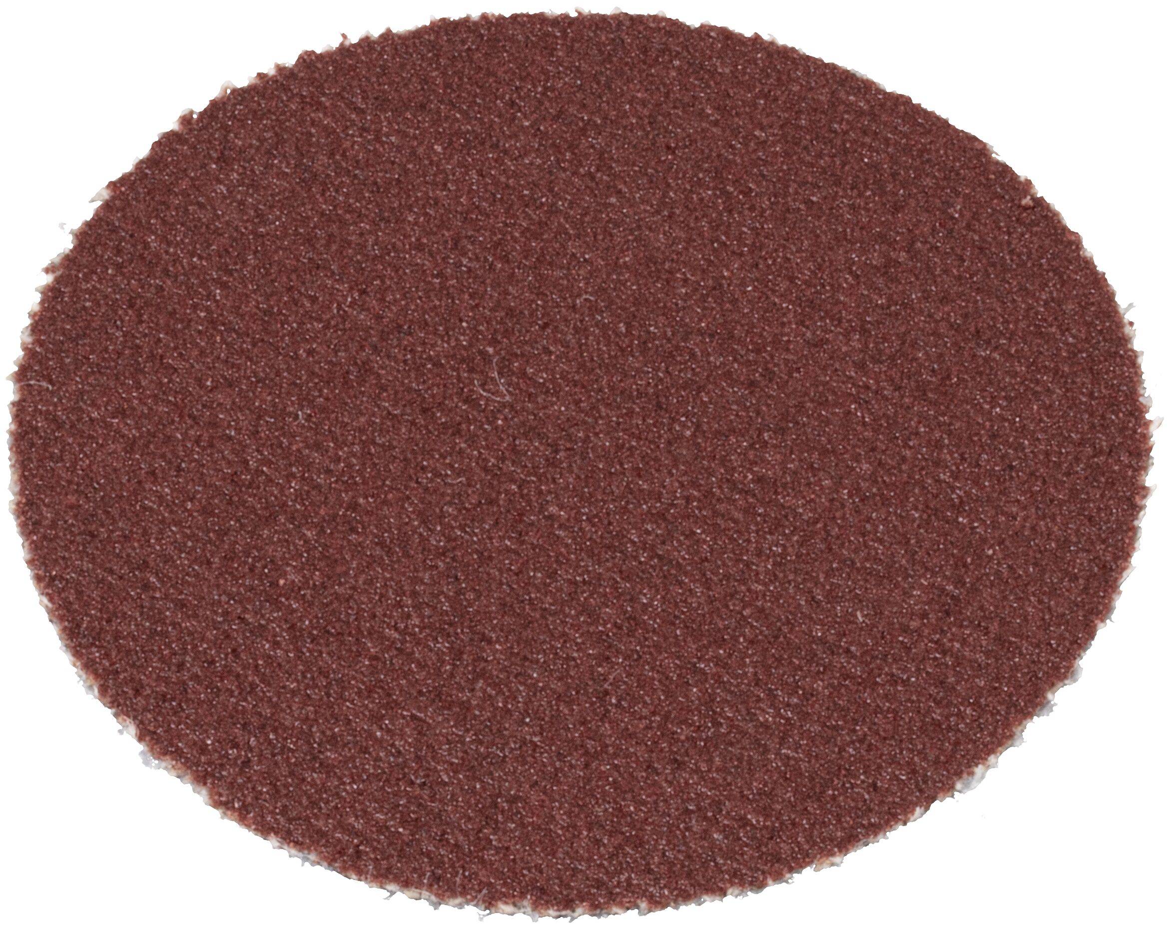 Kulatý, hrubý, hnědý brusný kotouč používaný k vyhlazování nebo tvarování materiálů.