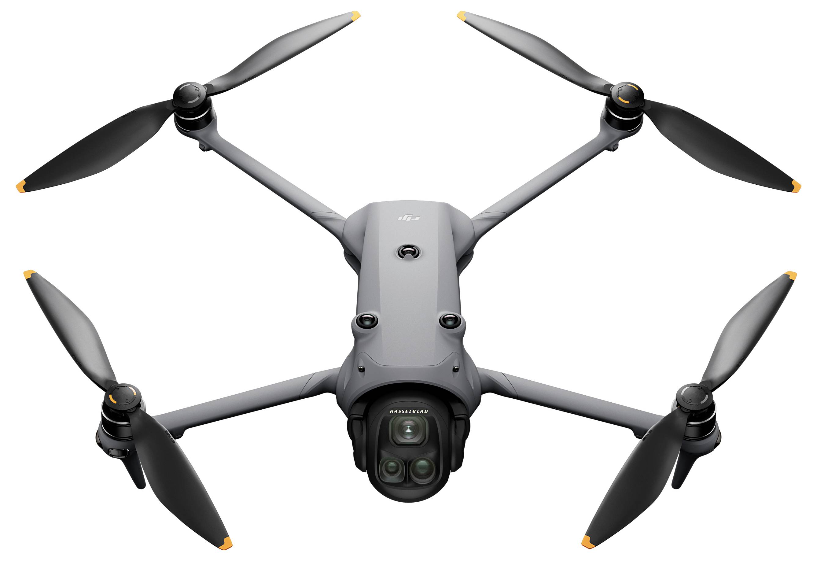 Shora je zobrazen šedý dron se čtyřmi vrtulemi, vybavený kamerou.