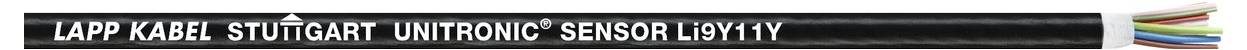 Černý banner s bílým textem zobrazuje nápis 'LAP.KABEL STUTTGART ULTRONIC SENSOR'. Na pravé straně je pruhovaný barevný vzor.