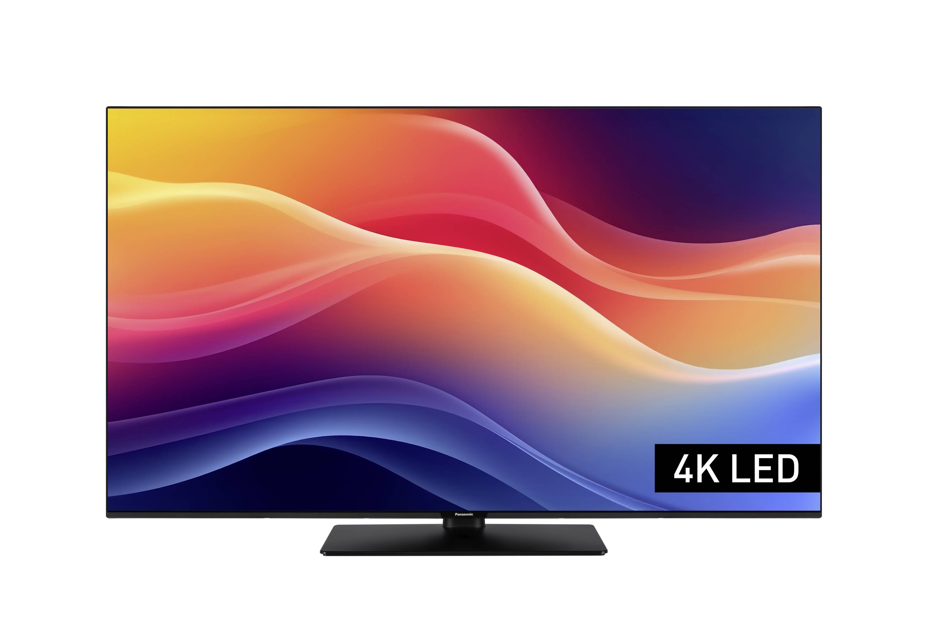 Plochá obrazovka televizoru zobrazující živý abstraktní vlnový vzor v červené, oranžové a modré barvě, s nápisem '4K LED' v pravém dolním rohu.