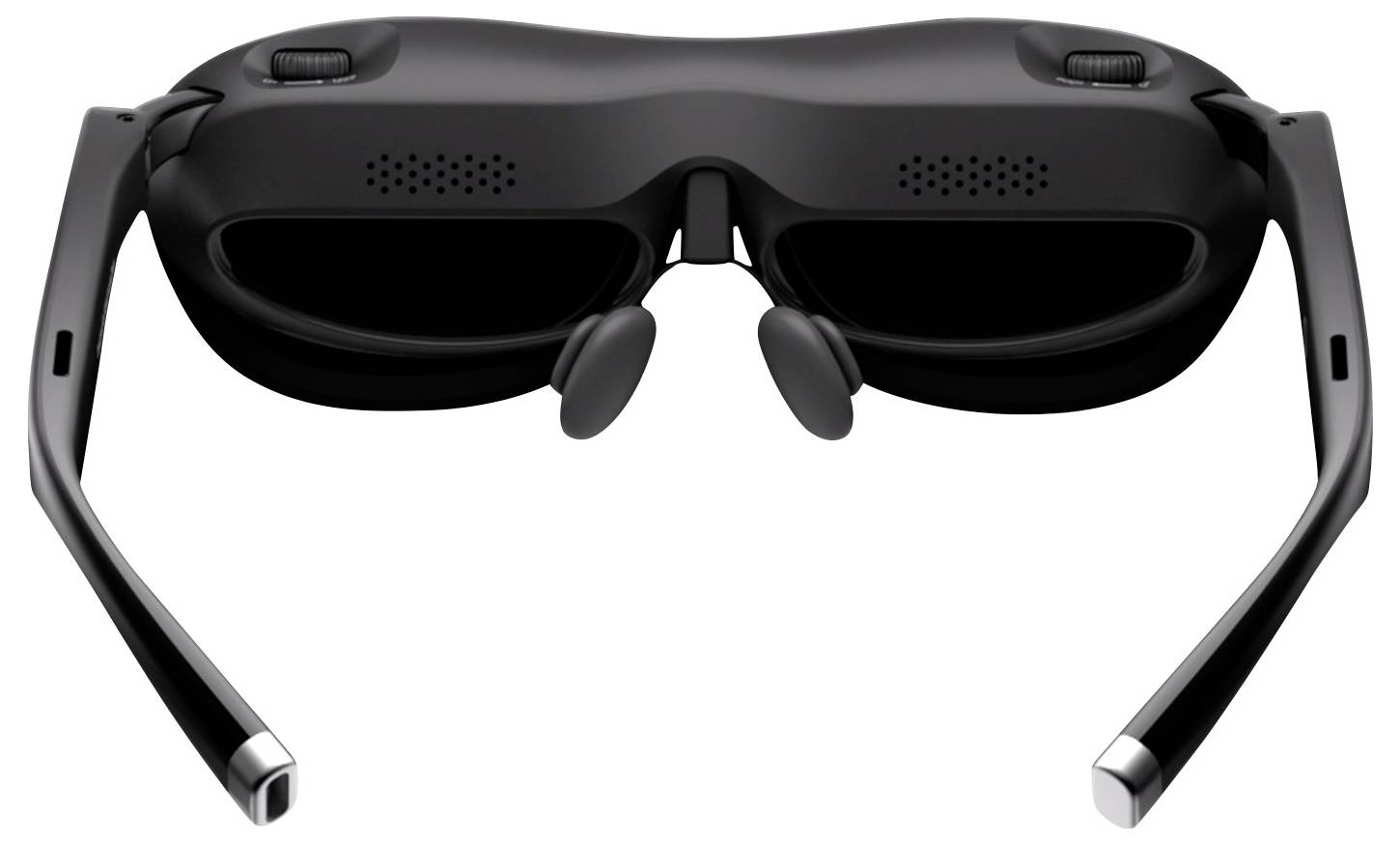 Elegantní pár černých brýlí pro virtuální realitu zachycených zezadu, zobrazující stranice, nosní opěrky a různé nastavovací ovládací prvky.