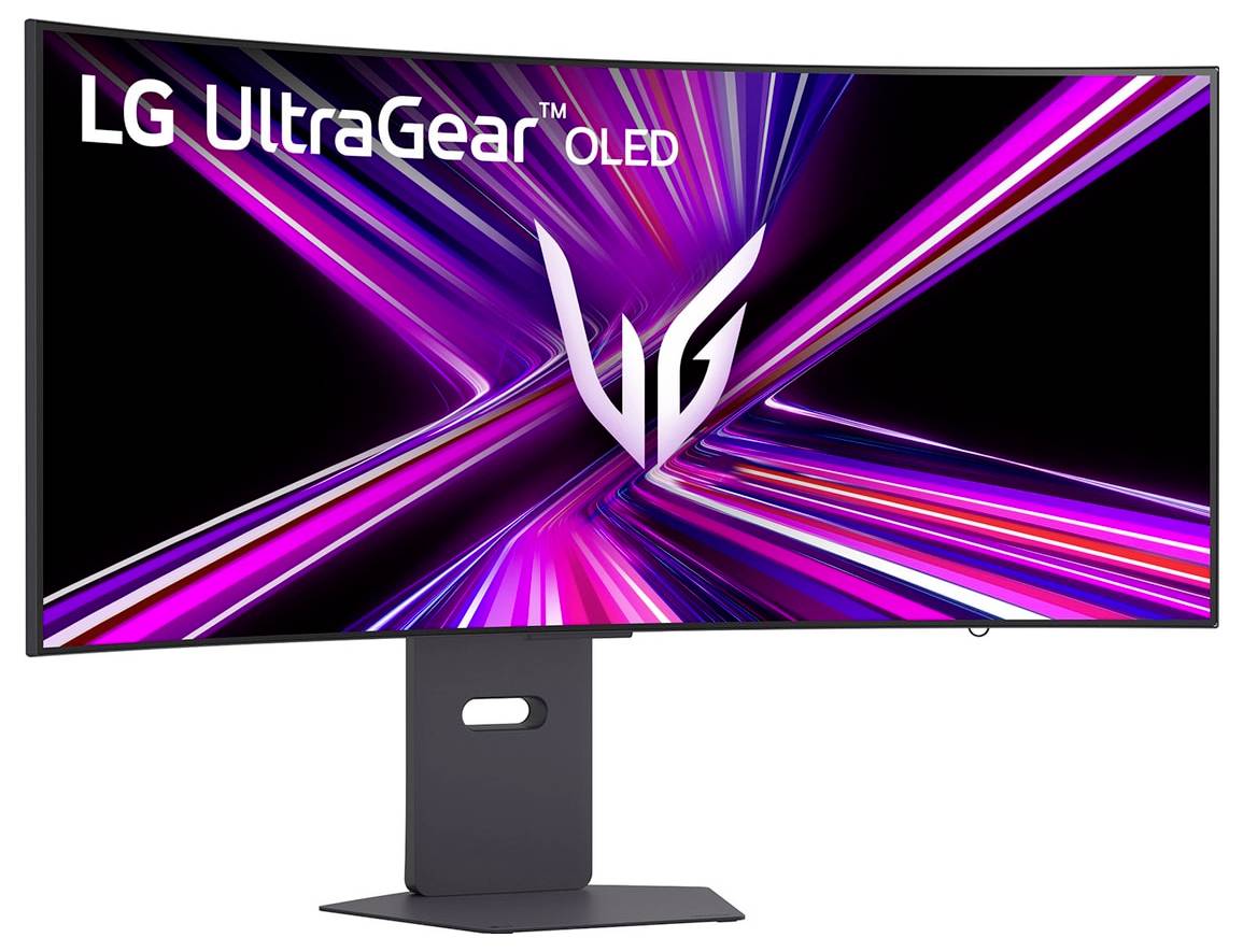 Obraz zobrazuje herní monitor LG UltraGear OLED s dynamickými, barevnými světelnými pruhy na obrazovce a logem společnosti 'LG'.