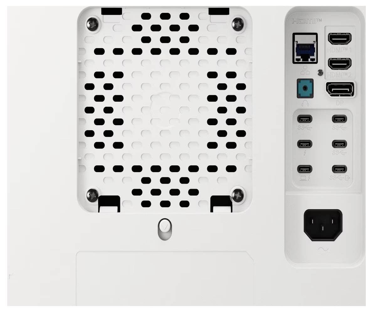 Zadní panel elektronického zařízení s několika HDMI porty, USB porty, vstupem napájení a větracím roštem.
