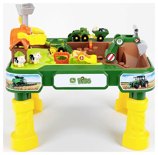 Dětský hrací stůl s hračkami zemědělského vybavení a zvířat. Obsahuje stodolu, traktor a figurky. Navrženo pro kreativní hru.