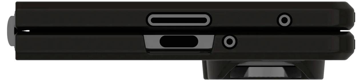 Boční pohled na složené černé elektronické zařízení s viditelnými tlačítky a lehce vyčnívající kamerovou čočkou na spodní straně.