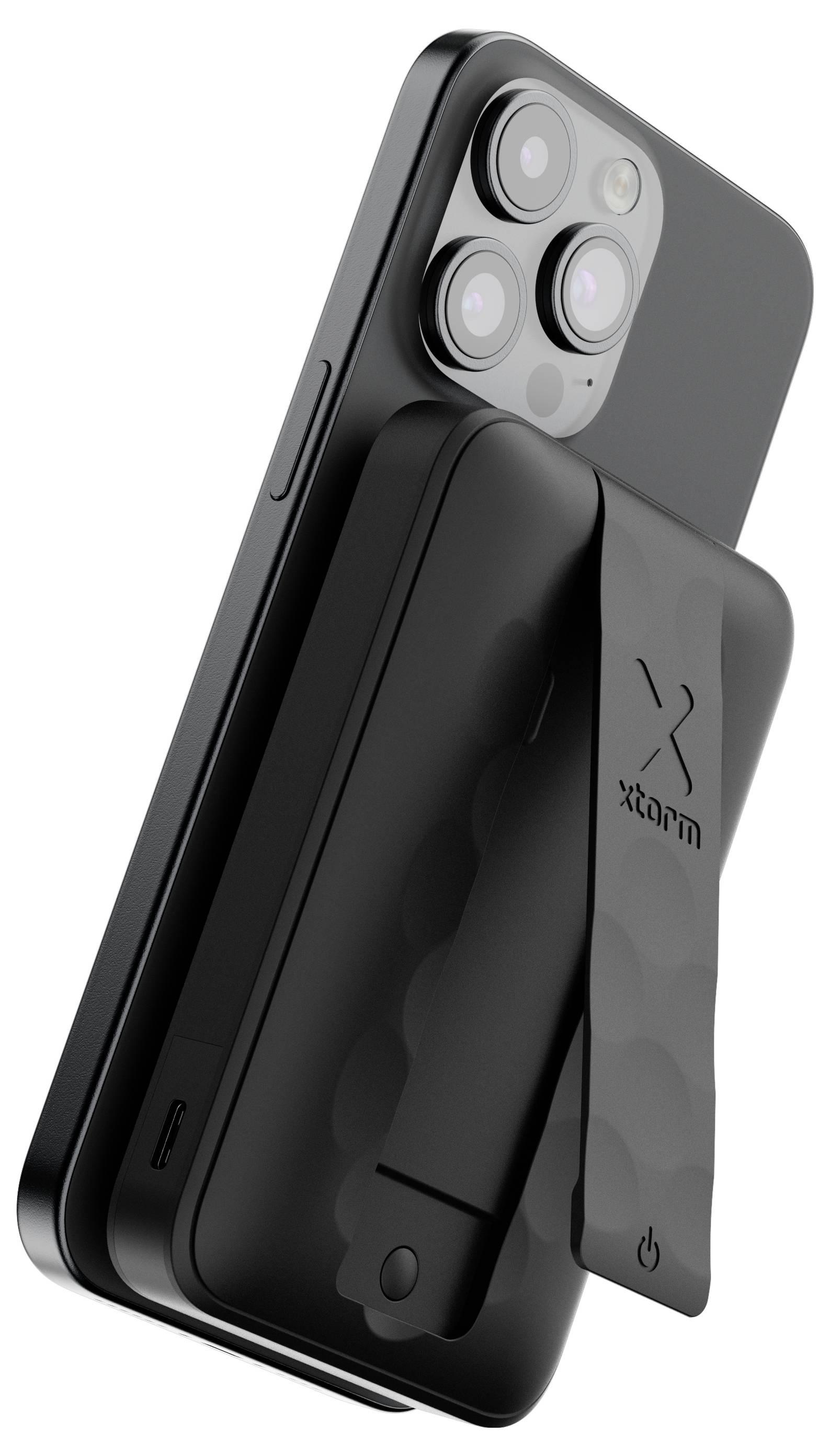 Černý smartphone s magnetickou powerbanoou připevněnou na zadní straně, na které je umístěno logo a tlačítko napájení.
