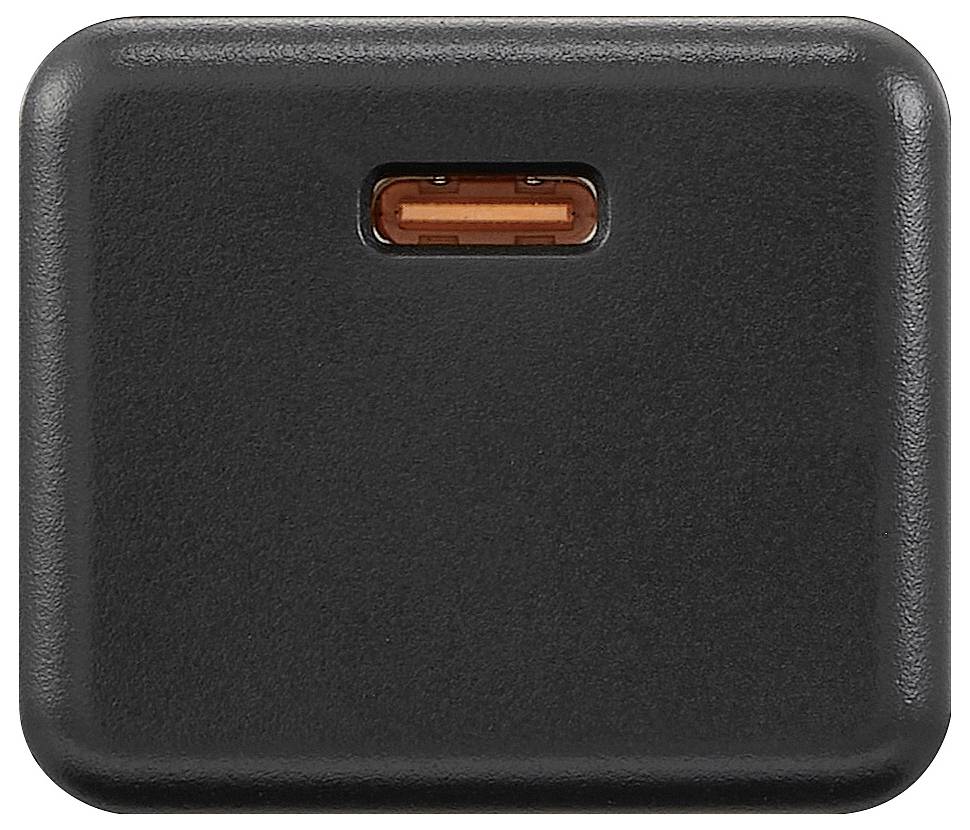 Černá USB síťová nabíječka s oranžovým USB-C portem uprostřed, určená pro nabíjení elektronických zařízení.