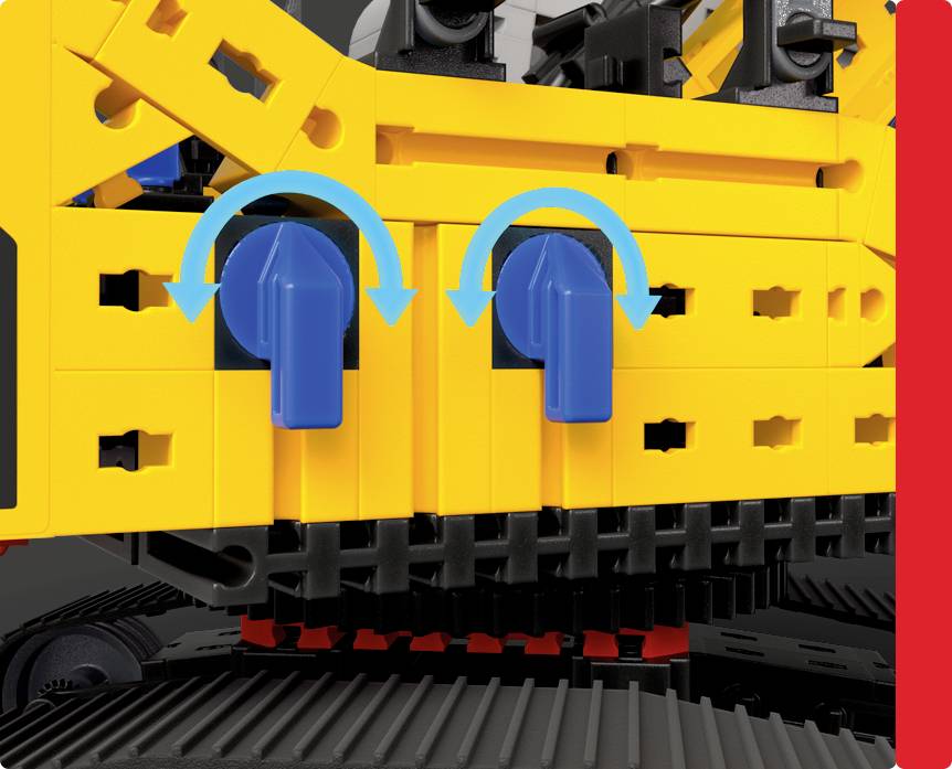 Detailní pohled na LEGO konstrukci ukazující dvě modré páky na žlutém povrchu se šipkami indikujícími pohyb dolů pro ovládání.