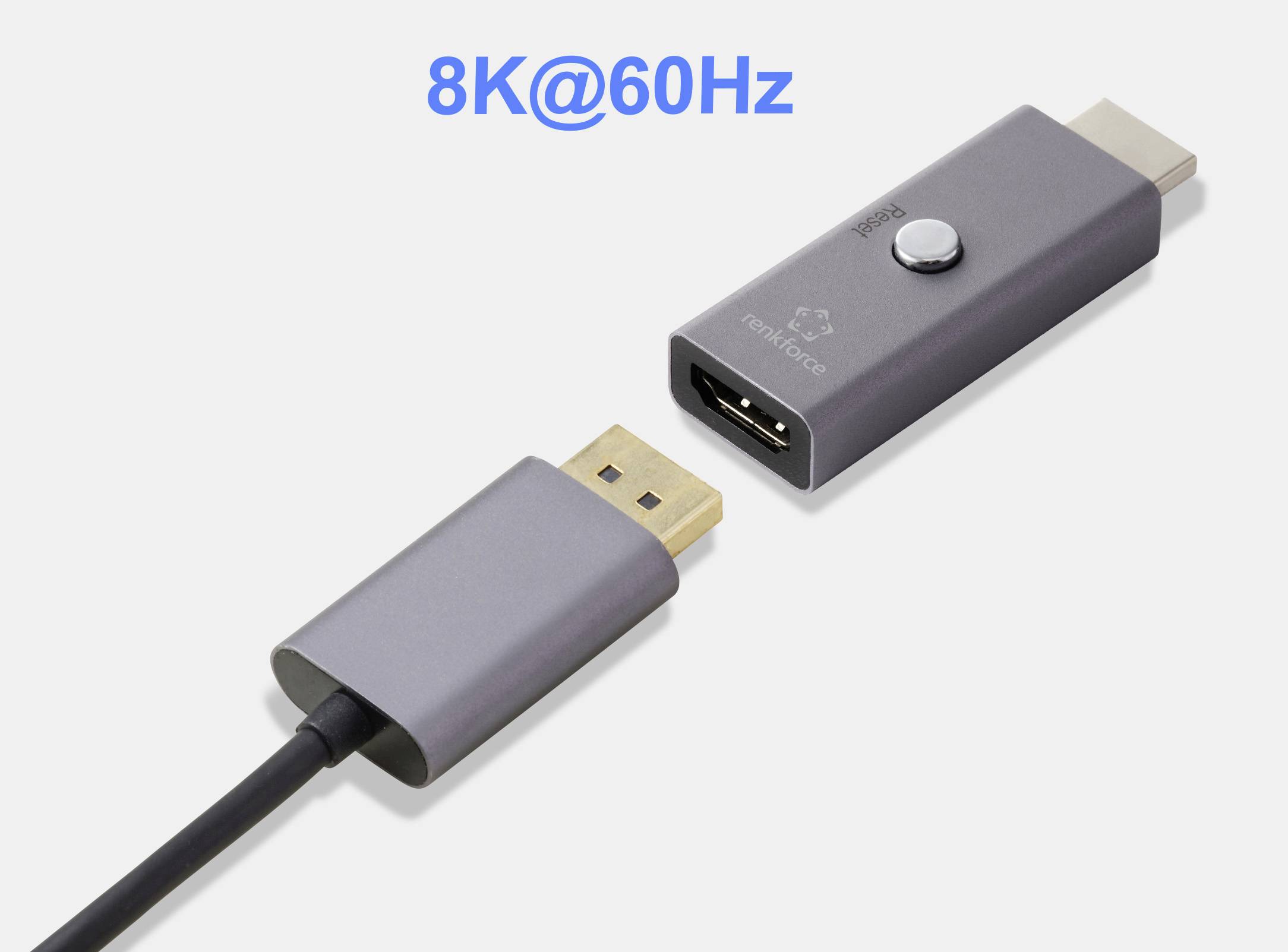 Šedý adaptér HDMI kabelu oddělený od portu, označený štítkem '8K@60Hz', který indikuje schopnost vysokého rozlišení.