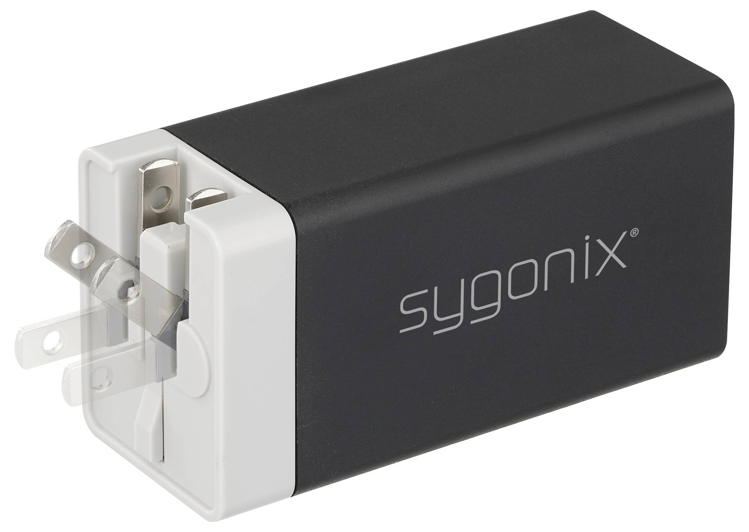 Černobílý síťový adaptér Sygonix s kovovými sklopitelnými kolíky, navržený pro všestranné elektrické připojení a přenosnost.