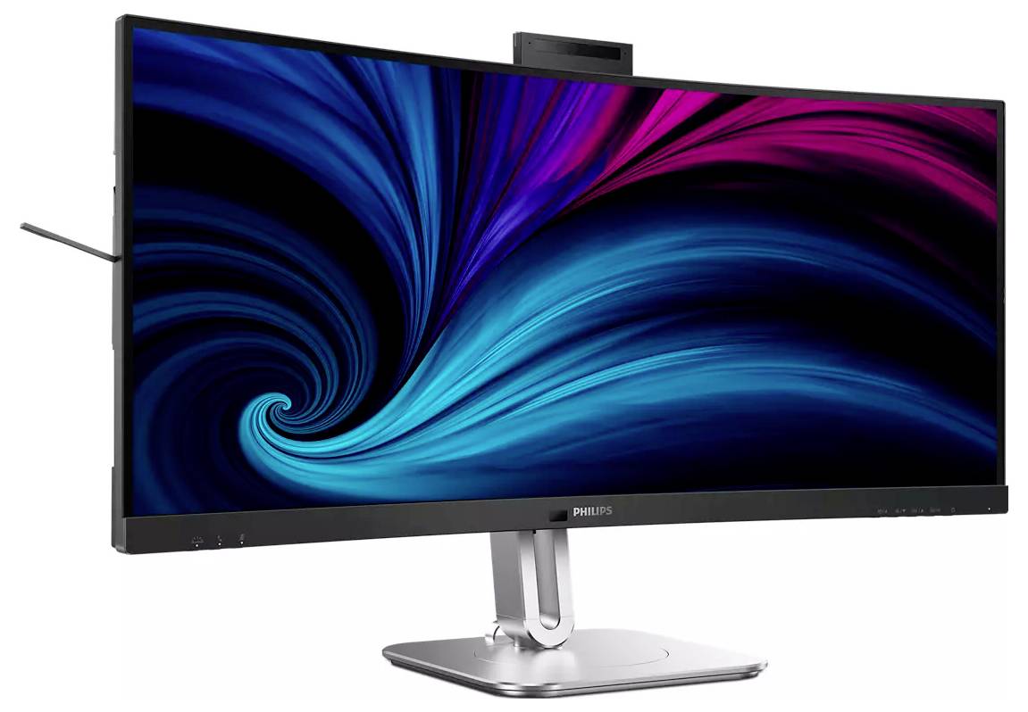 Širokoúhlý počítačový monitor zobrazující dynamický vír modrých a purpurových vzorů na obrazovce, vyznačující se elegantním, moderním designem.