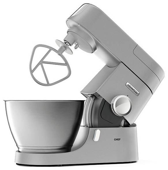 Stříbrný kuchyňský robot se šlehací mísou, vybavený hnětacím hákem, určený pro míchání a hnětení surovin v kuchyňském prostředí.