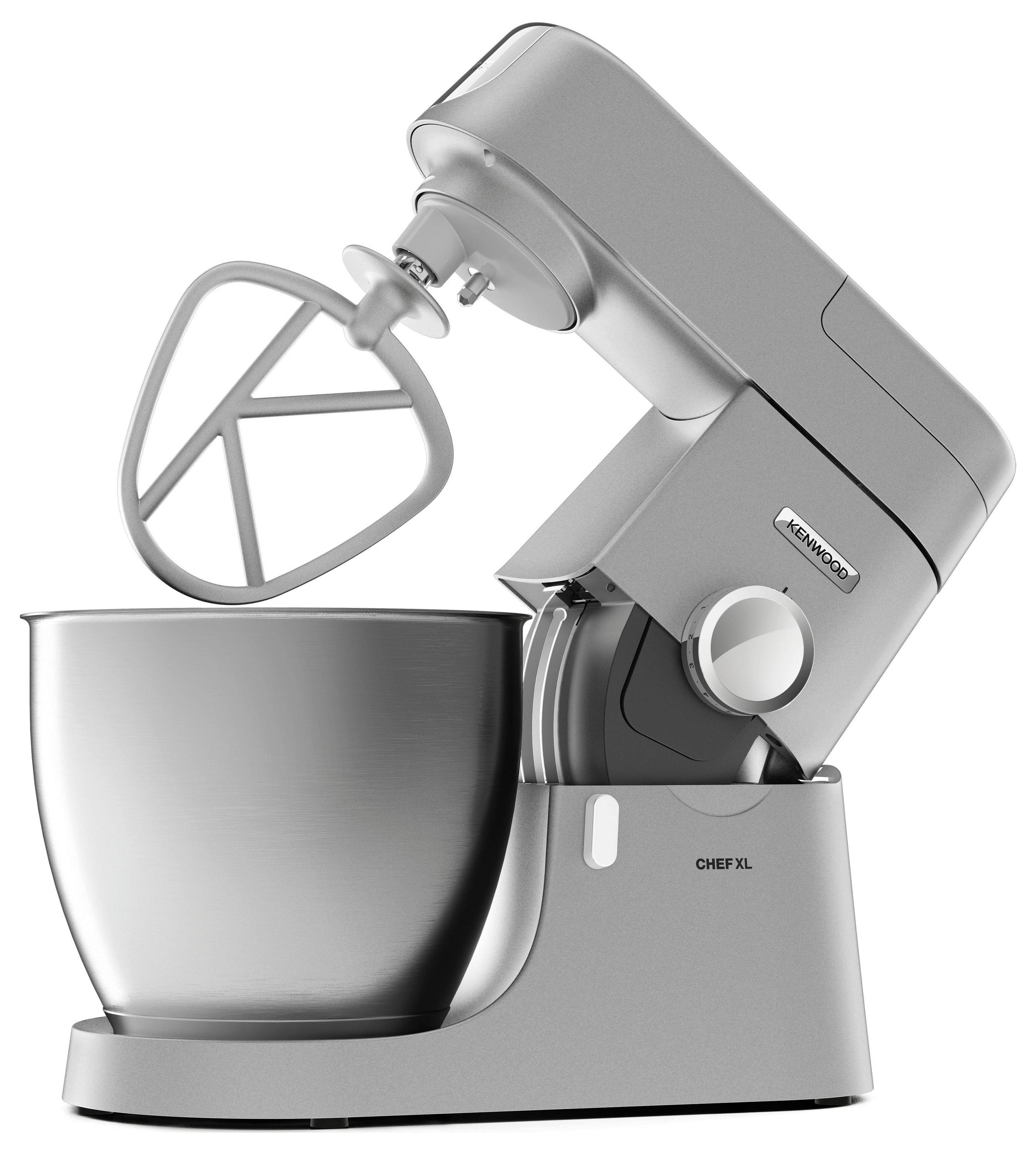 Stříbrný kuchyňský robot se nerezovou mísou a plochým šlehacím nástrojem, označený logem 'KENWOOD' a 'CHEF XL'.