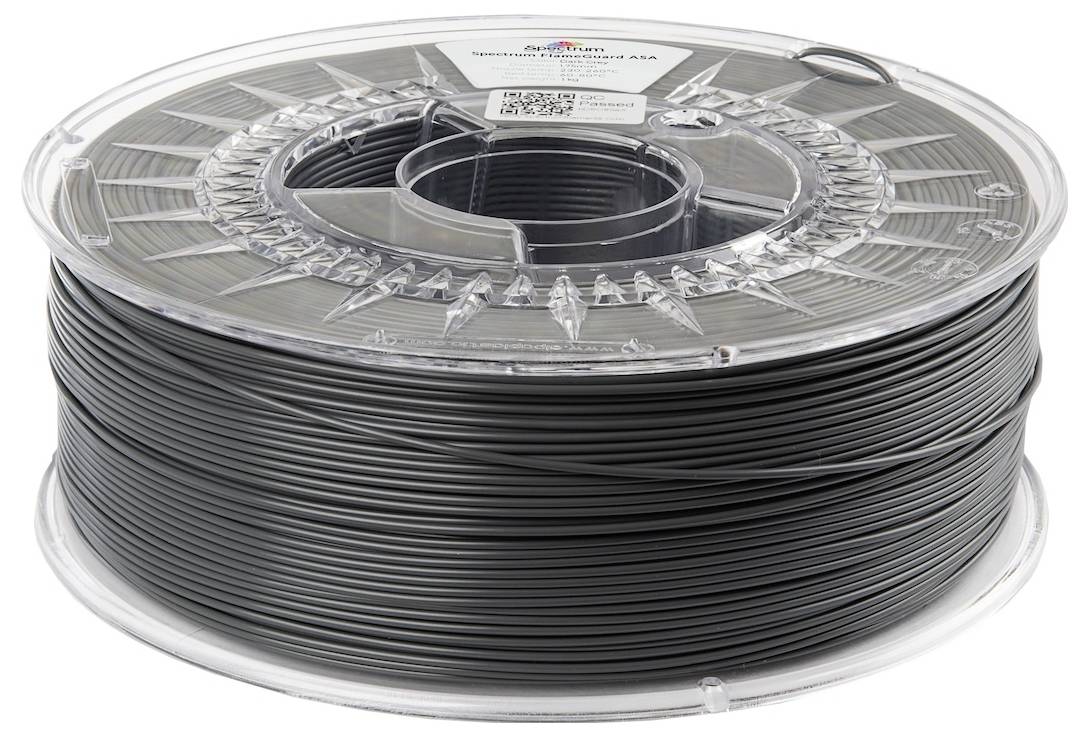 Cívka 3D tiskového filamentu označená "Shaxon Nylon 1.75mm", barva černá. Cívka má průhledné boky pro kontrolu zbývajícího filamentu.