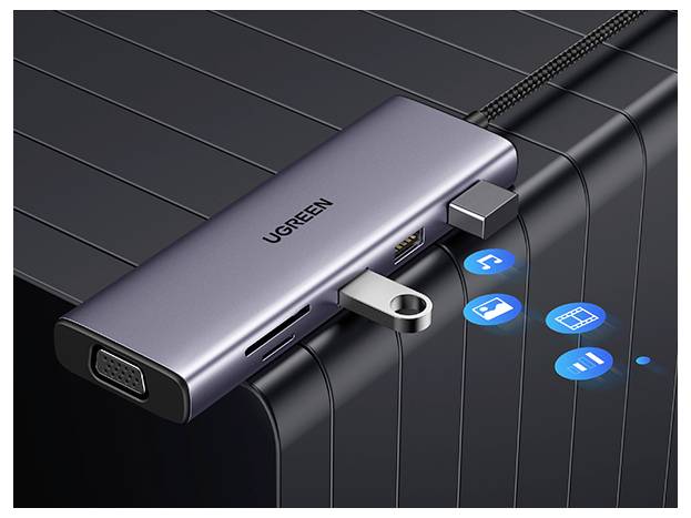 Víceportový USB hub s elegantním designem je zapojen do zařízení. Nabízí porty pro HDMI, USB a SD karty, doplněné ikonami pro hudbu, video a přehrávání.
