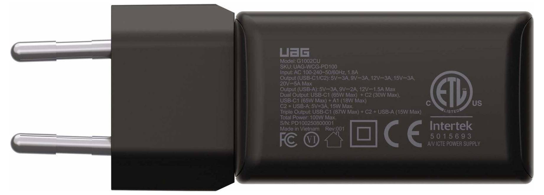 Dvoupólová evropská USB nástěnná nabíječka s brandingem 'UAG' a certifikačními značkami, včetně log ETL a CE, je zobrazena.
