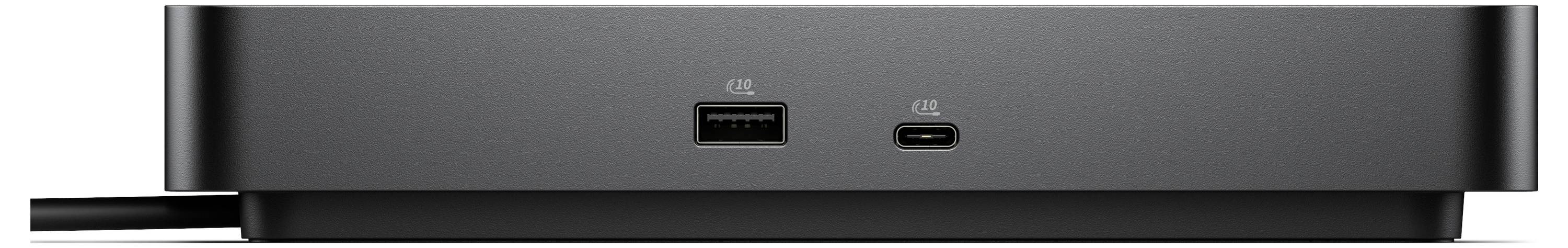 Detailní záběr černého zařízení zobrazující USB port a USB-C port na jeho přední straně.