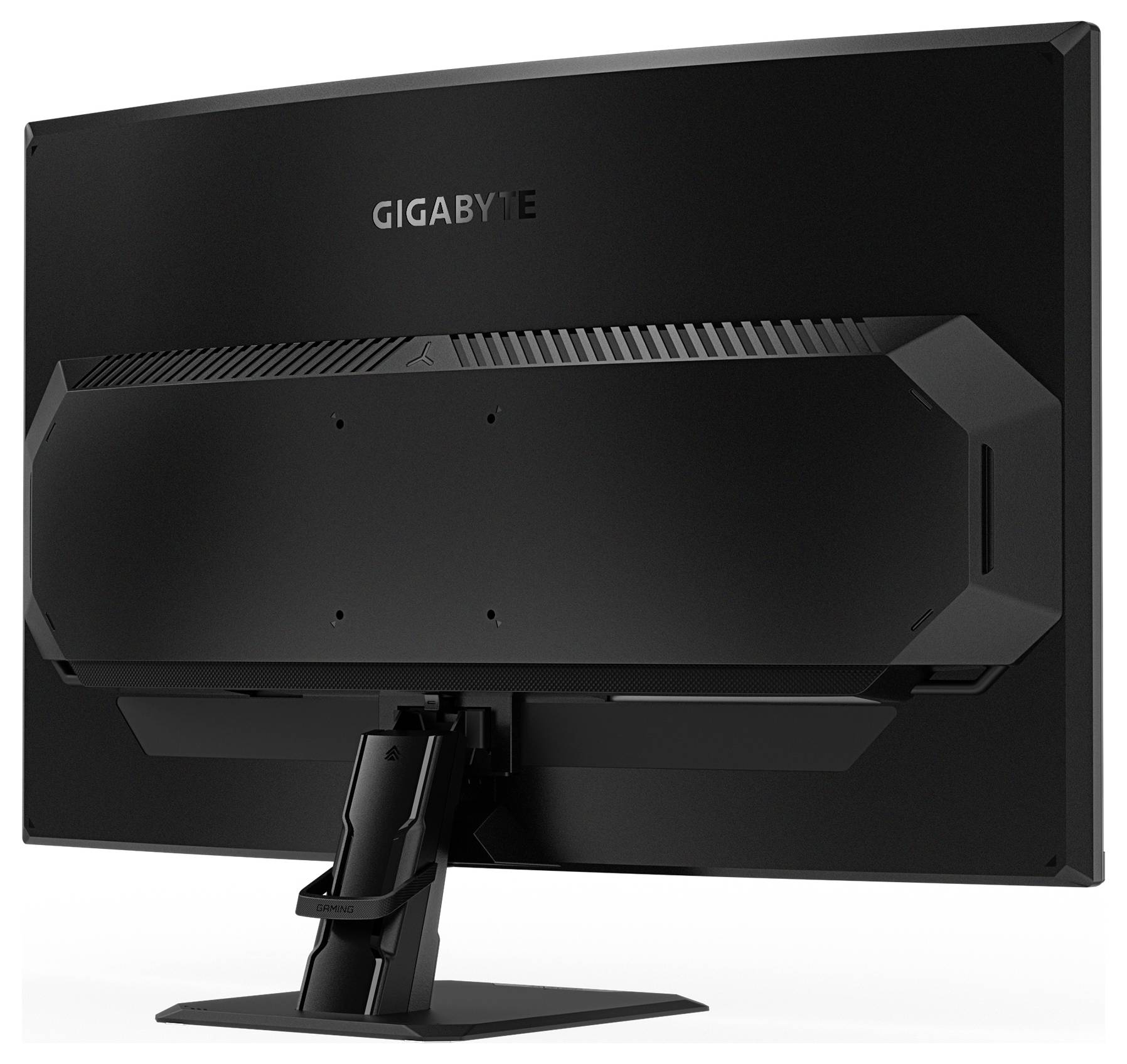 Černý počítačový monitor Gigabyte pohledem zezadu, zobrazující jeho stojan a design ventilace.
