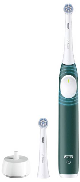 Elektrický zubní kartáček s tmavě zelenou rukojetí, dvěma vyměnitelnými nástavci a bílou nabíjecí stanicí, značky 'Oral-B iO'.