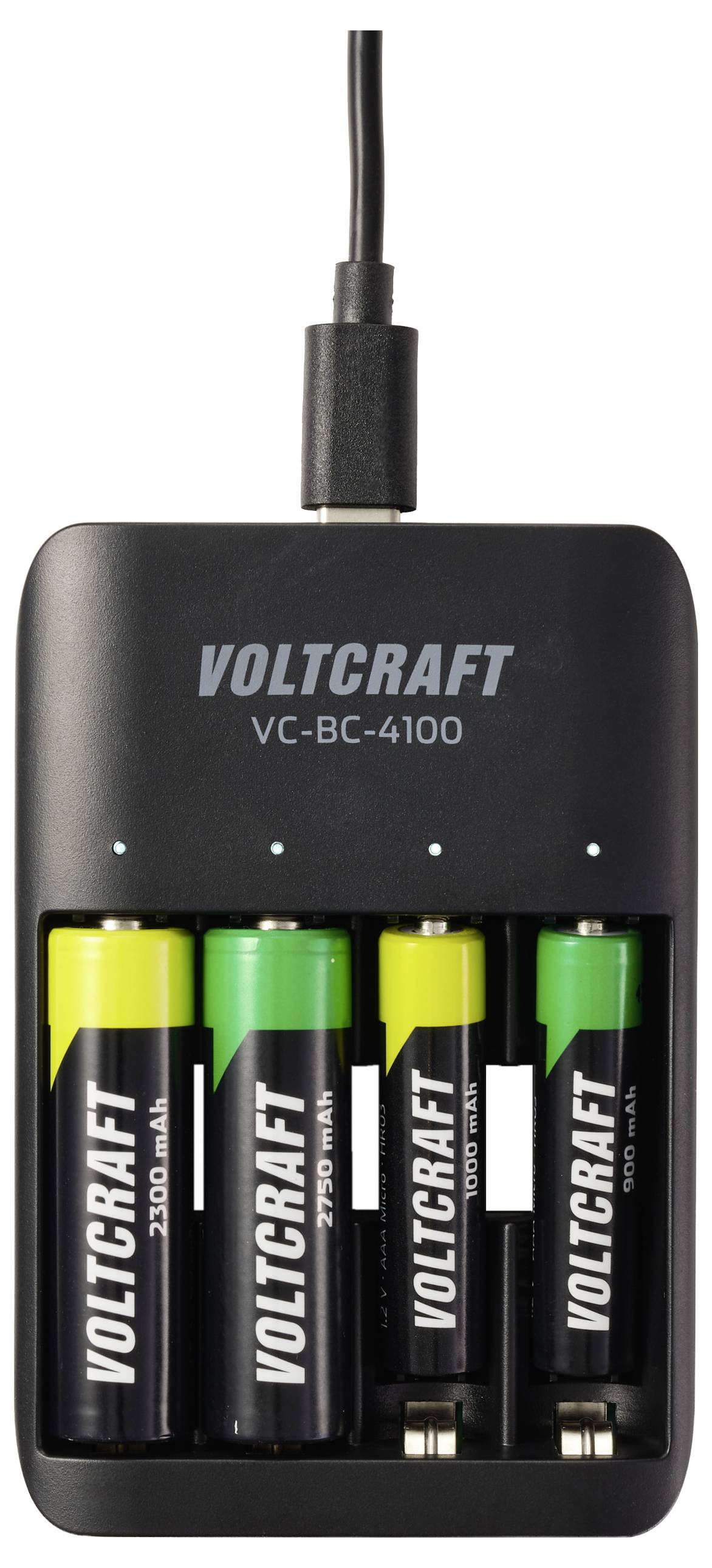Nabíječka baterií se čtyřmi bateriemi AA, značky 'Voltcraft', model 'VC-BC-4100', s zelenými a žlutými indikátory stavu nabití.