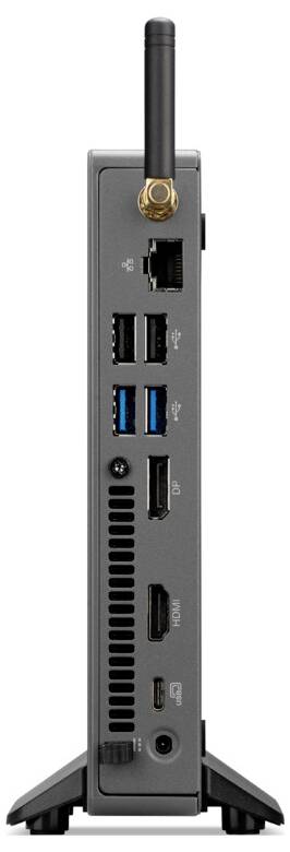 Vertikální pohled na zadní panel kompaktního počítače, zobrazující různé porty: USB, HDMI, Ethernet a audio, s anténou nahoře.