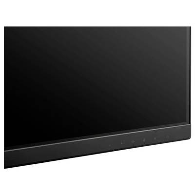 Detailní pohled na černý plochý monitor s tenkou lištou, zobrazující pravý dolní roh a část obrazovky.