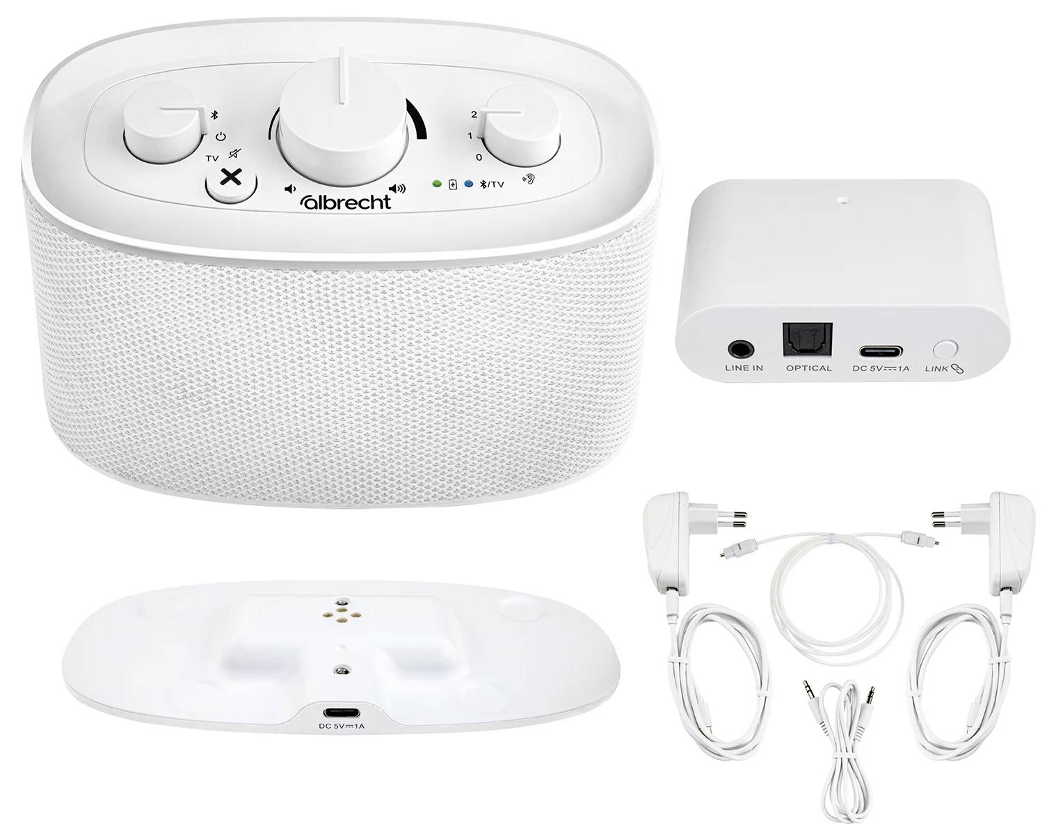 Přenosná stereo reproduktorová sada s Bluetooth, která zahrnuje hlavní reproduktor, nabíjecí základnu a základní kabely pro připojení a napájení.