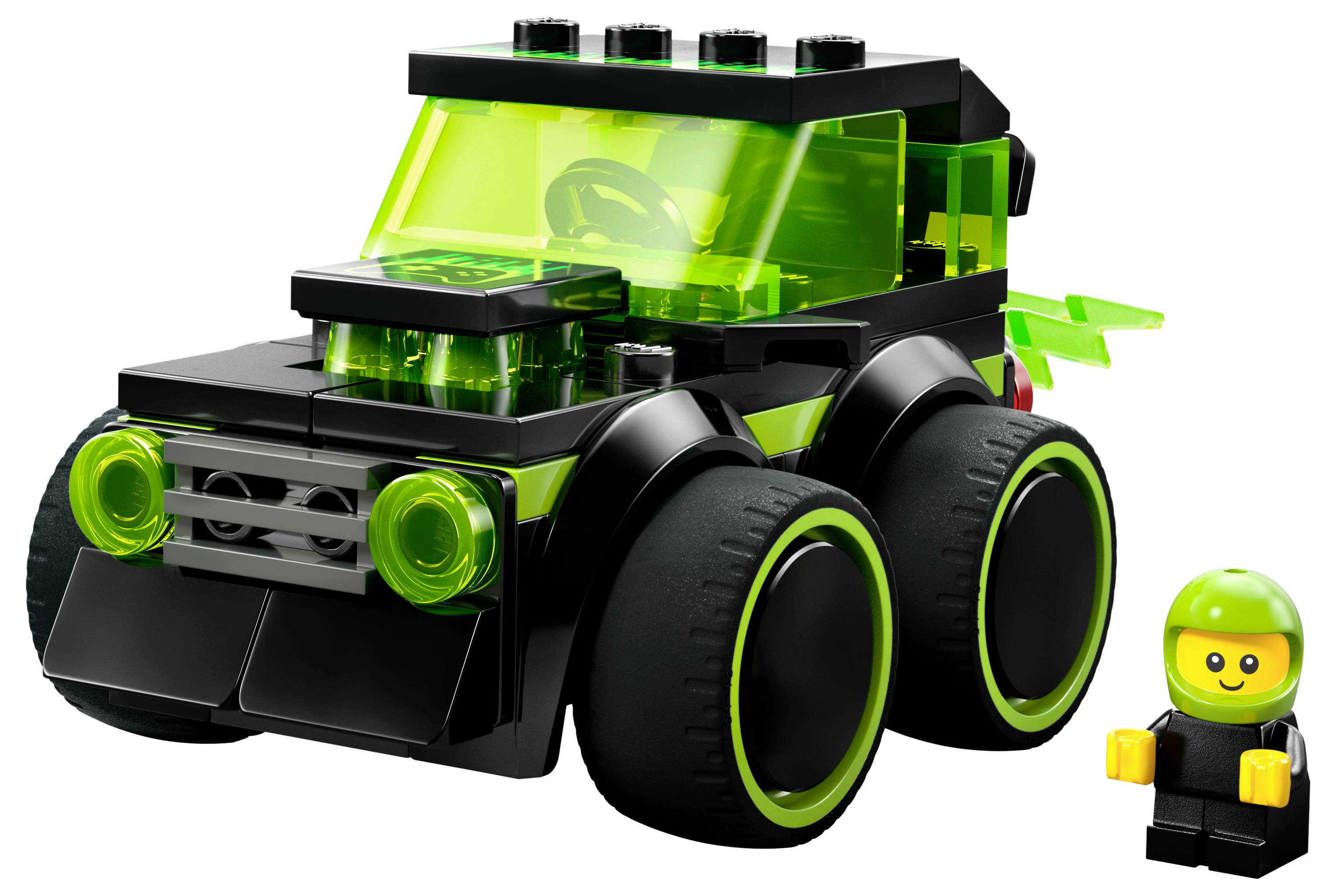 Černozelené hračkářské auto s velkými koly, vybavené neonovými akcenty, je doprovázeno malou figurkou v zelené přilbě.
