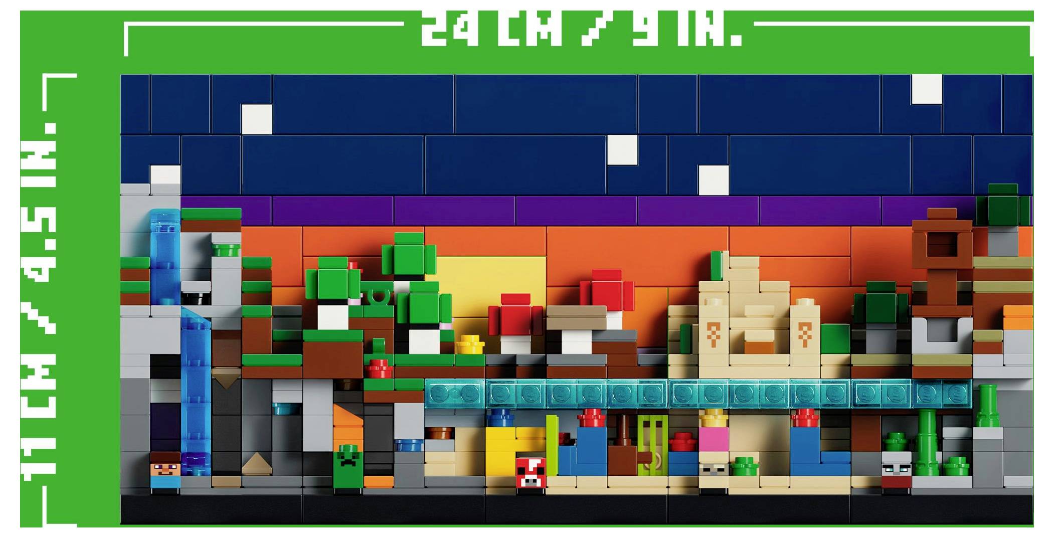 Lego umělecké dílo zobrazující pestrobarevnou pixelovanou krajinu se stromy, vodou a budovami před západem slunce. Rozměry: 24x11 cm.