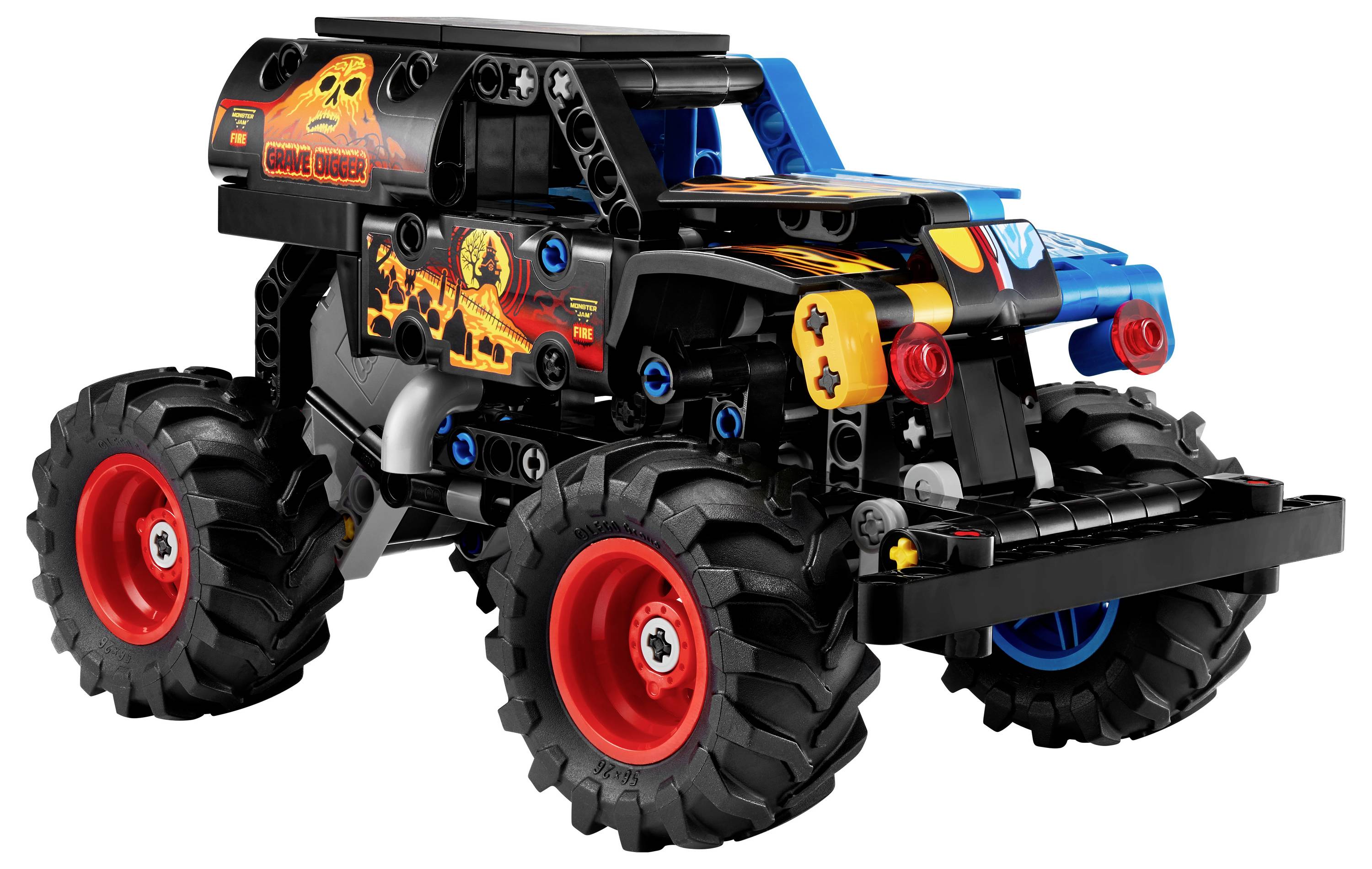 Černý a modrý hračkářský monster truck s velkými červenými koly, vybavený plamennými nálepkami a nápisem 'Grave Digger' na bocích.