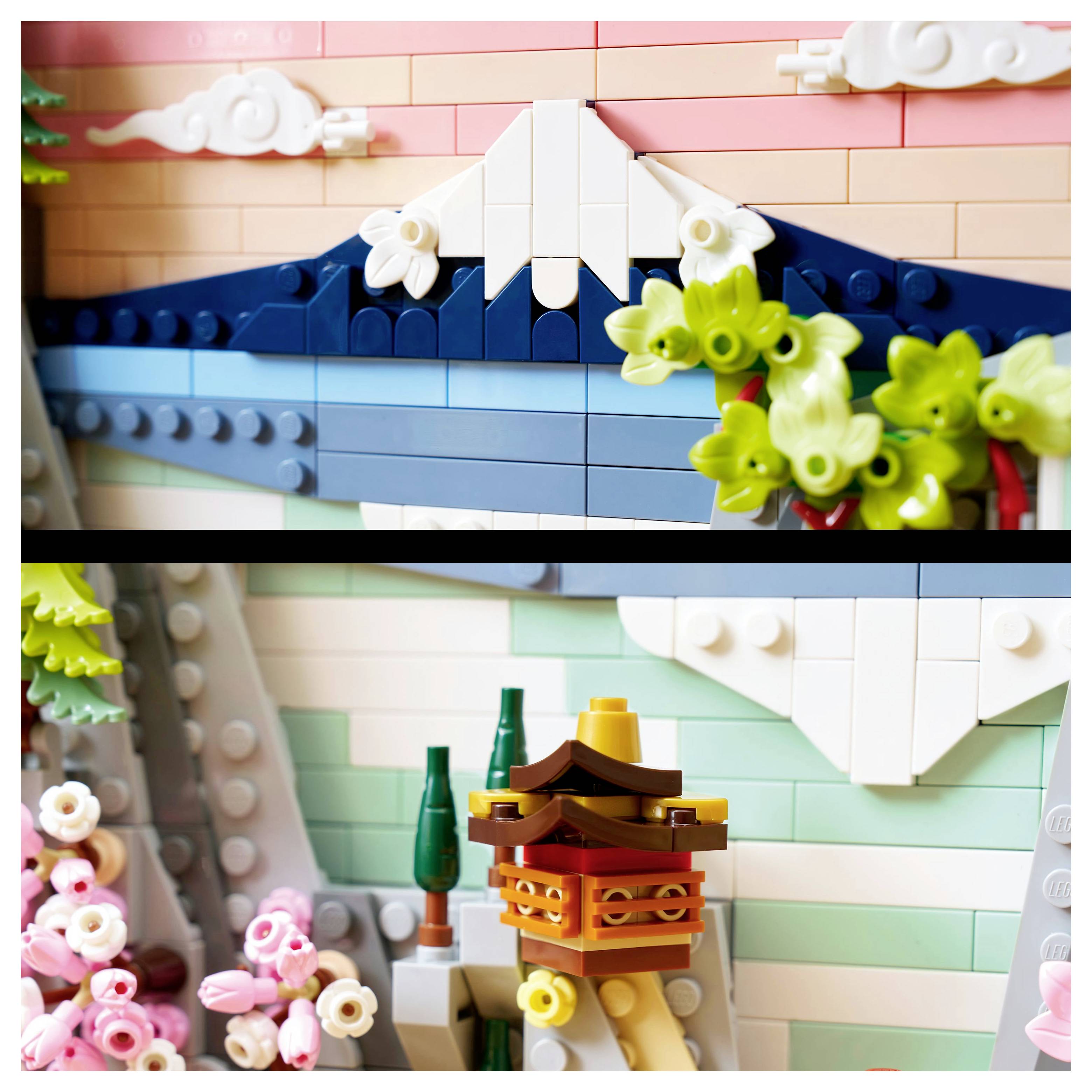 Lego mozaika zobrazující horu Fuji s mraky a třešňovými květy, zvýrazňující jemné detaily slavného japonského horského výjevu.