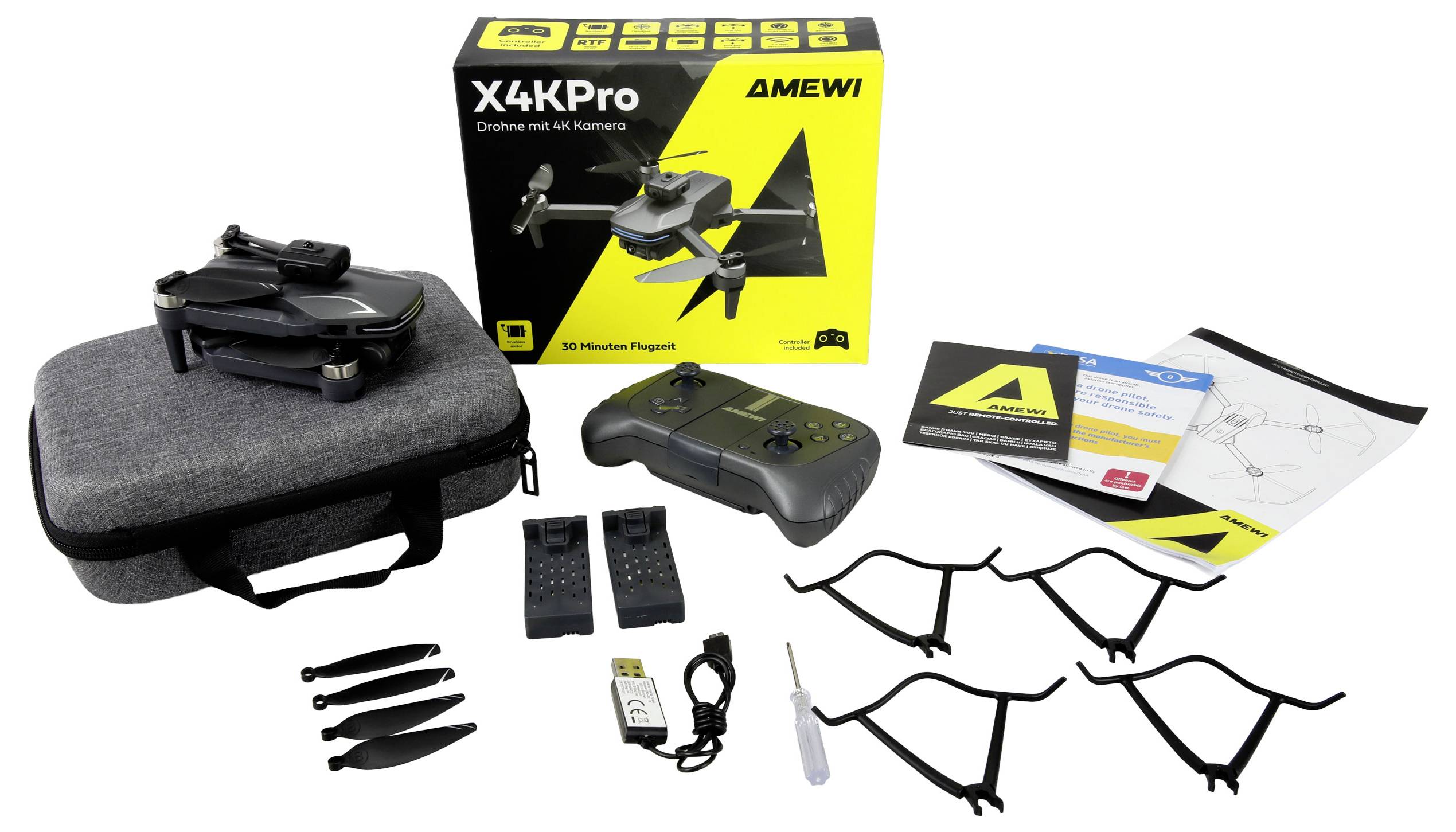 Sada dronu Amewi X4KPro se skládajícím se dronem, dálkovým ovládáním, šedým přenosným pouzdrem, vrtulemi, USB nabíječkou, kryty vrtulí, návodem k použití a krabicí.