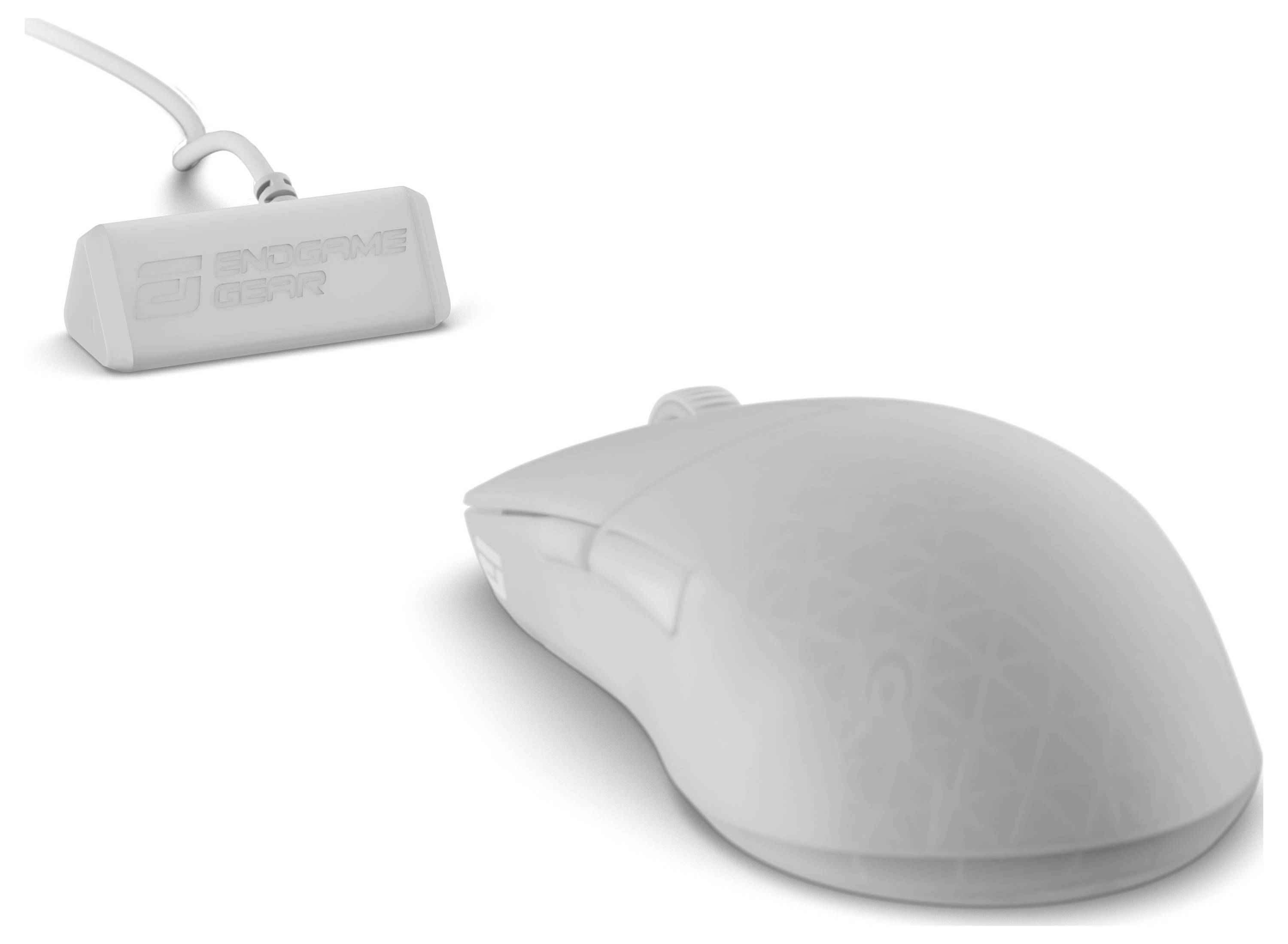 Bezdrátová počítačová myš a její USB přijímač, oba v bílé barvě, umístěné na bílém povrchu. Myš má geometrický vzor.