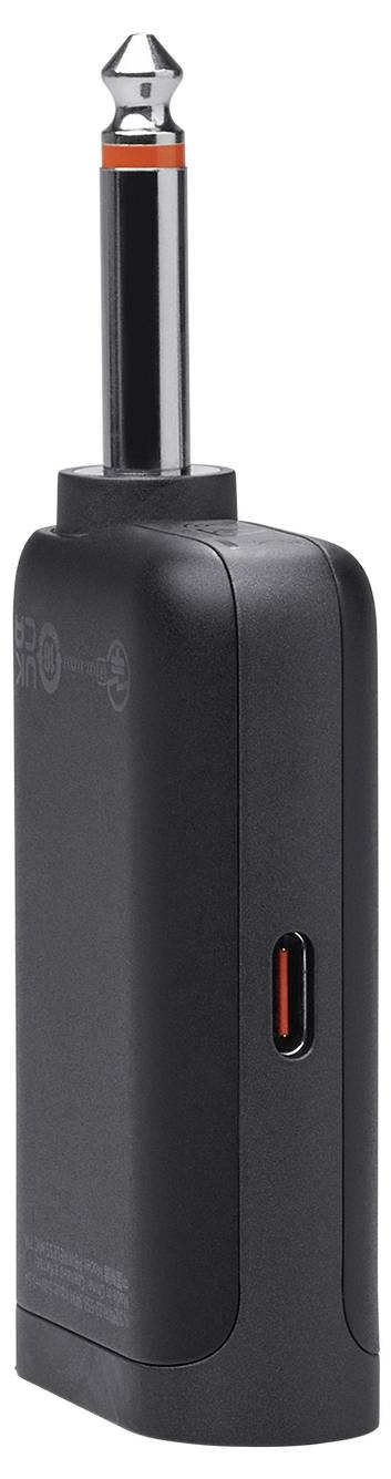 Kompaktní, černý bezdrátový audio vysílač s 1/4palcovou zástrčkou a USB-C nabíjecím portem, používaný pro připojení hudebních nástrojů k zesilovačům.