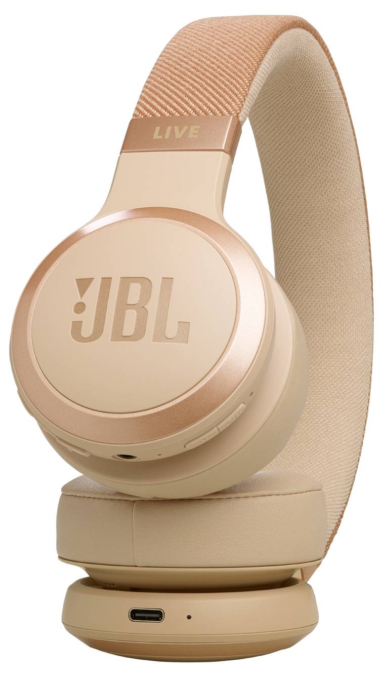 Béžové bezdrátové náhlavní sluchátka s logem značky, vybavené polstrovanými měkkými náušníky a nastavitelným hlavovým mostem.