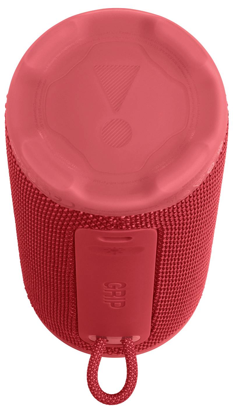 Červený přenosný Bluetooth reproduktor s texturovaným textilním povrchem a ovládacími tlačítky na horní straně, navržený pro vertikální umístění s montážní smyčkou.