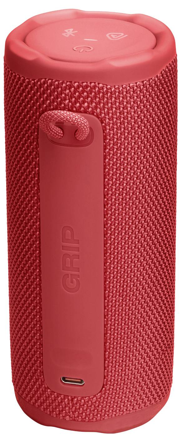 Červený přenosný Bluetooth reproduktor s texturovaným úchopem, s ovládacími tlačítky hlasitosti a napájení na horní straně a nabíjecím portem umístěným na spodní straně.