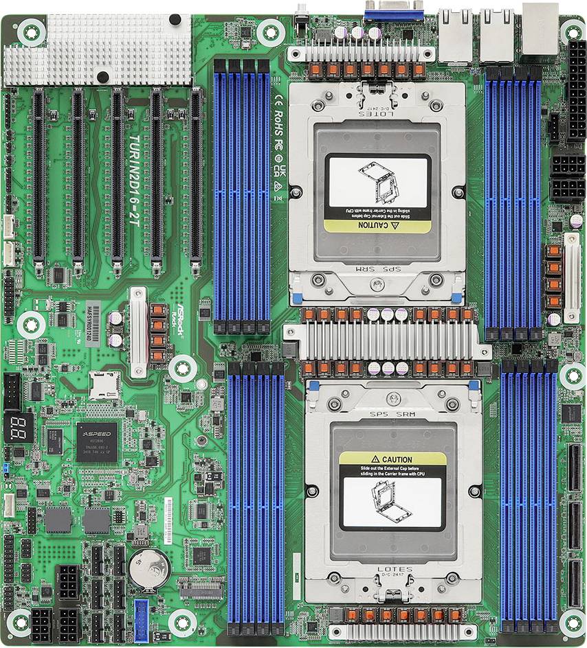 Zelená počítačová základní deska se dvěma velkými sockety pro CPU, několika paměťovými sloty osazenými modrými chladiči a různými konektory a porty.