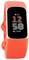 Oranžový fitness tracker zobrazující čas '12:58', tepovou frekvenci '68' a počet kroků '7 546' na digitálním displeji.