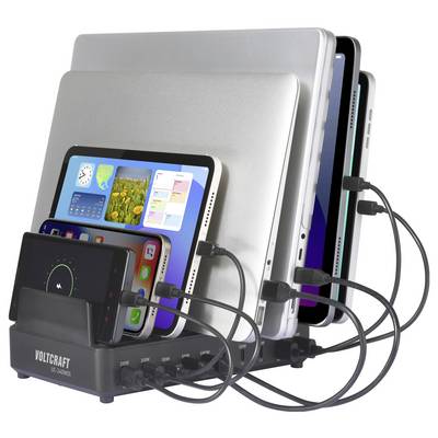 Nabíjecí stanice 'Voltcraft UC-10ACQ' s připojenými několika zařízeními: notebooky, tablety a smartphone, které jsou všechny současně nabíjeny.