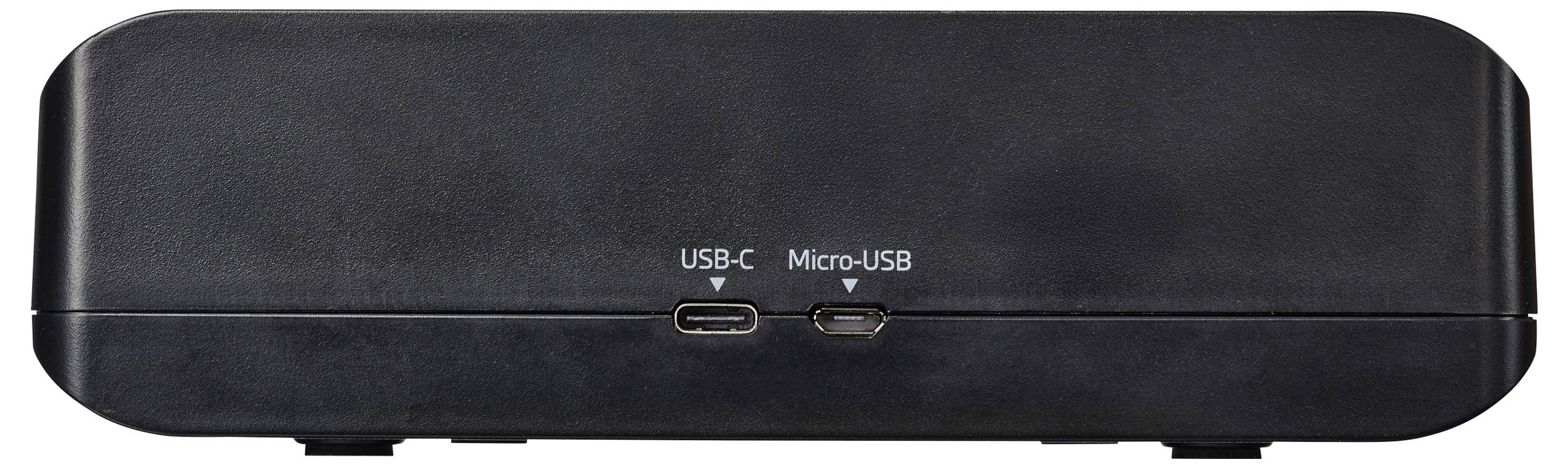 Černé zařízení s porty orientovanými dopředu označenými „USB-C" a „Micro-USB" pro možnosti připojení.