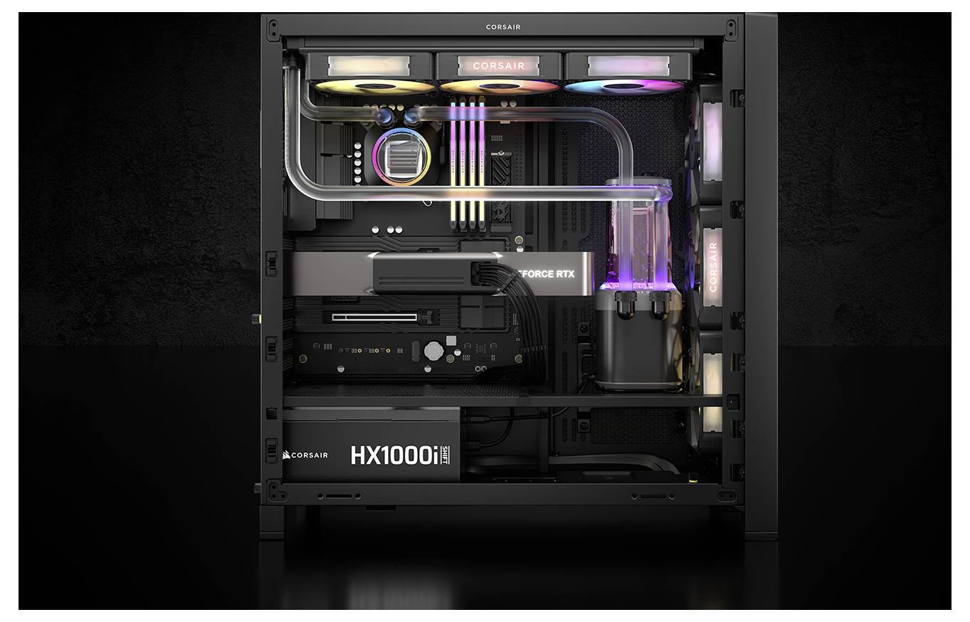 Průhledný počítačový kryt odhaluje vnitřní hardware včetně napájecího zdroje Corsair HX1000i, chladicích trubic a barevných LED světel.